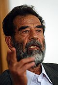Saddam Hussein speaking at a pre-trial hearing.